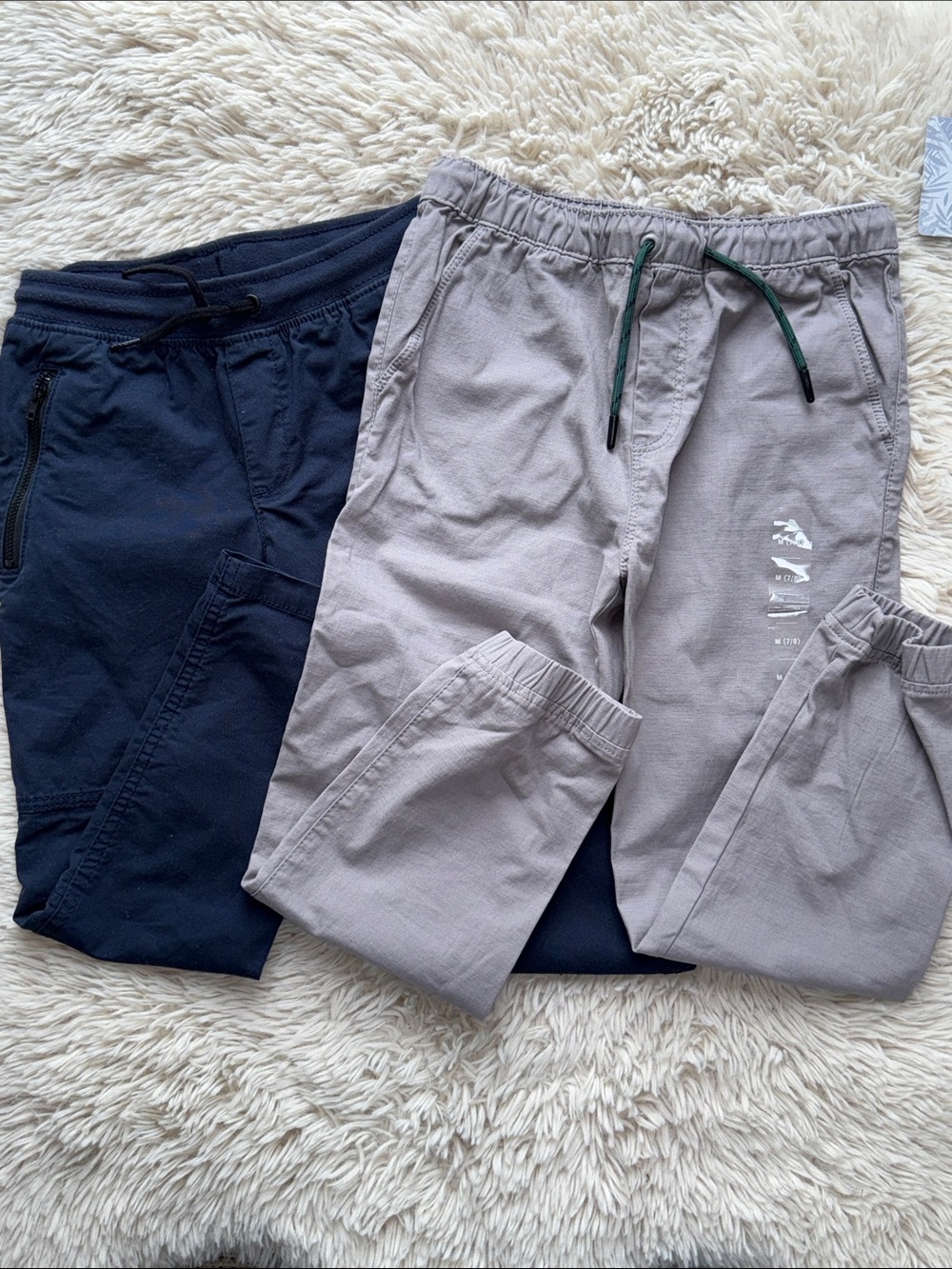 Lots of 2 pair of drawstring pants size 7/8- navy blue and gray